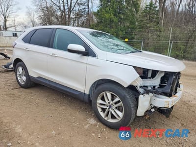 Czwarte zdjęcie samochodu z boku: 2016 FORD EDGE SEL VIN:2FMPK4J94GBC41349 - miniatura
