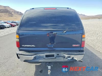 Zdjęcie 6 z 13 samochodu: 2004 GMC YUKON XL K1500 VIN:1GKFK16Z54J285623 - miniatura