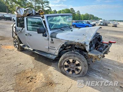 Czwarte zdjęcie samochodu z boku: 2014 JEEP WRANGLER UNLIMITED SPORT VIN:1C4BJWDG6EL201620 - miniatura