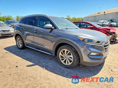 Czwarte zdjęcie samochodu z boku: 2016 HYUNDAI TUCSON SE VIN:KM8J3CA43GU178630 - miniatura