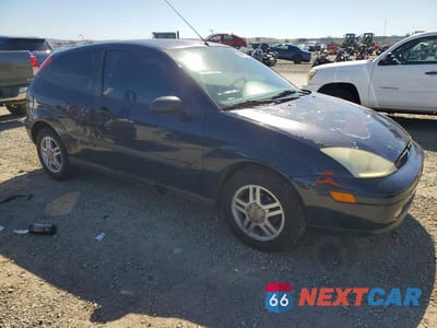 Czwarte zdjęcie samochodu z boku: 2002 FORD FOCUS ZX3 VIN:3FAFP31392R110490 - miniatura