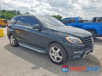 Czwarte zdjęcie samochodu z boku: 2015 MERCEDES-BENZ ML 400 4MATIC VIN:4JGDA5GB2FA539205 - miniatura