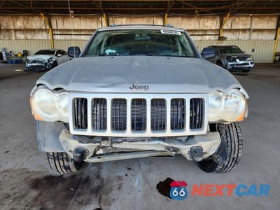 Piąte zdjęcie samochodu w środku: 2010 JEEP GRAND CHEROKEE LAREDO VIN:1J4PR4GK3AC130688 - miniatura