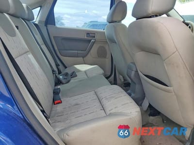 Zdjęcie 10 z 11 samochodu: 2009 FORD FOCUS SE VIN:1FAHP35NX9W116066 - miniatura