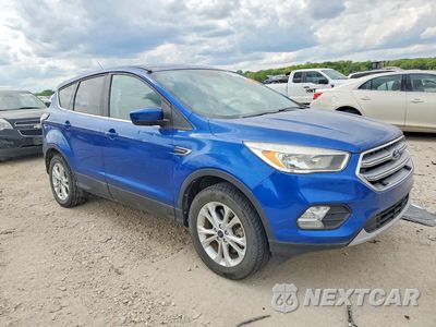 Czwarte zdjęcie samochodu z boku: 2017 FORD ESCAPE SE VIN:1FMCU9G90HUD10966 - miniatura