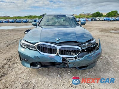 Piąte zdjęcie samochodu w środku: 2021 BMW 330I VIN:3MW5R1J03M8B65484 - miniatura