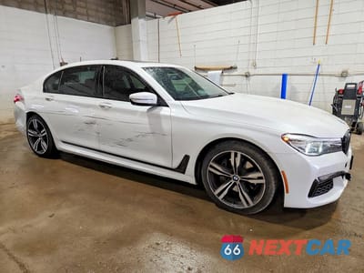 Czwarte zdjęcie samochodu z boku: 2016 BMW 740 I VIN:WBA7E2C57GG714497 - miniatura