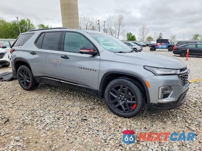 Czwarte zdjęcie samochodu z boku: 2023 CHEVROLET TRAVERSE PREMIER VIN:1GNEVKKW7PJ331576 - miniatura