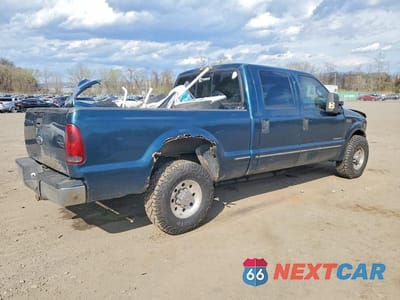 Trzecie zdjęcie samochodu z tyłu: 1999 FORD F250 SUPER DUTY VIN:1FTNW20F0XED18573 - miniatura