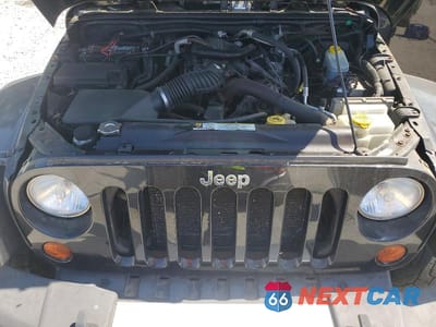 Zdjęcie 12 z 13 samochodu: 2010 JEEP WRANGLER UNLIMITED SAHARA VIN:1J4BA5H10AL163788 - miniatura