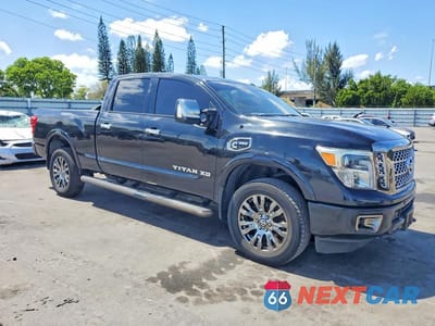 Czwarte zdjęcie samochodu z boku: 2017 NISSAN TITAN XD PLATINUM RESERVE VIN:1N6BA1F42HN561043 - miniatura