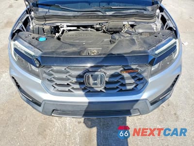 Zdjęcie 12 z 13 samochodu: 2022 HONDA PASSPORT TRAIL SPORT VIN:5FNYF8H65NB005096 - miniatura