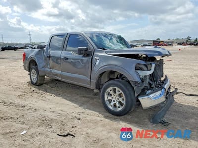 Czwarte zdjęcie samochodu z boku: 2022 FORD F150 SUPERCREW VIN:1FTEW1CP1NFA46511 - miniatura