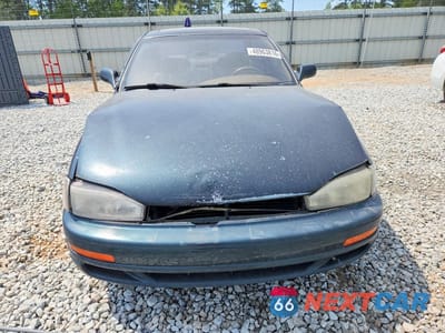 Piąte zdjęcie samochodu w środku: 1994 TOYOTA CAMRY XLE V6 VIN:4T1GK13EXRU854176 - miniatura