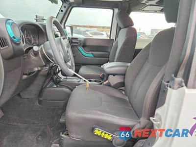 Zdjęcie 7 z 14 samochodu: 2017 JEEP WRANGLER SPORT VIN:1C4AJWAG6HL531102 - miniatura