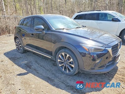 Czwarte zdjęcie samochodu z boku: 2021 MAZDA CX-3 GRAND TOURING VIN:JM1DKFD77M1510139 - miniatura