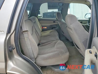 Zdjęcie 11 z 13 samochodu: 2002 GMC YUKON VIN:1GKEC13V42R251696 - miniatura