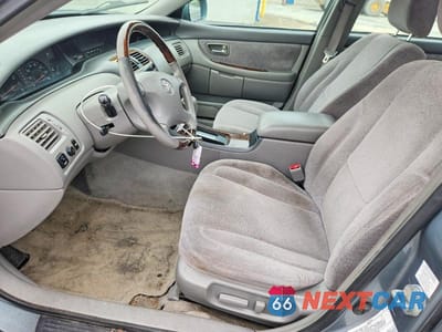 Zdjęcie 7 z 12 samochodu: 2003 TOYOTA AVALON XLS VIN:4T1BF28B03U330979 - miniatura