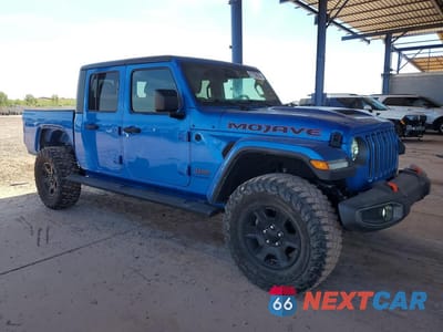 Czwarte zdjęcie samochodu z boku: 2021 JEEP GLADIATOR MOJAVE VIN:1C6JJTEG7ML580111 - miniatura