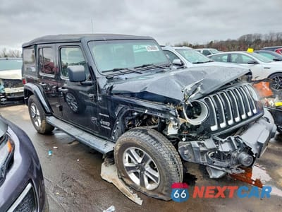 Czwarte zdjęcie samochodu z boku: 2020 JEEP WRANGLER UNLIMITED SAHARA VIN:1C4HJXEG1LW225494 - miniatura