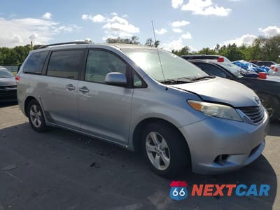 Czwarte zdjęcie samochodu z boku: 2011 TOYOTA SIENNA LE VIN:5TDKK3DC2BS043652 - miniatura
