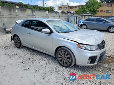Czwarte zdjęcie samochodu z boku: 2011 KIA FORTE SX VIN:KNAFW6A35B5408579 - miniatura