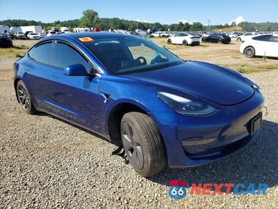 Czwarte zdjęcie samochodu z boku: 2021 TESLA MODEL 3 VIN:5YJ3E1EA2MF051934 - miniatura