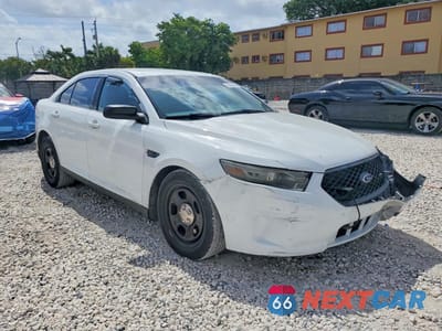 Czwarte zdjęcie samochodu z boku: 2016 FORD TAURUS POLICE INTERCEPTOR VIN:1FAHP2L83GG107031 - miniatura