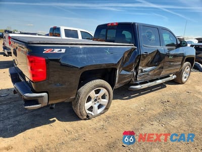Trzecie zdjęcie samochodu z tyłu: 2017 CHEVROLET SILVERADO K1500 LT VIN:1GCUKREC8HF193624 - miniatura