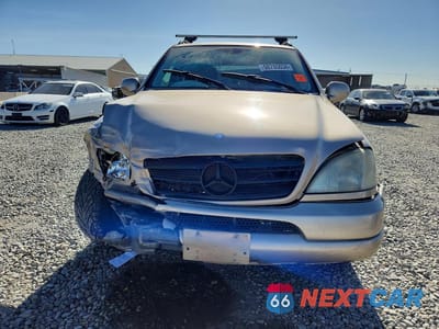 Piąte zdjęcie samochodu w środku: 2001 MERCEDES-BENZ ML 320 VIN:4JGAB54E51A247152 - miniatura