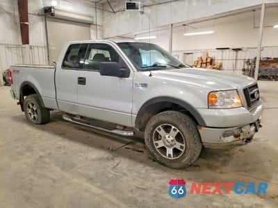 Czwarte zdjęcie samochodu z boku: 2004 FORD F150 VIN:1FTPX14534FA31865 - miniatura