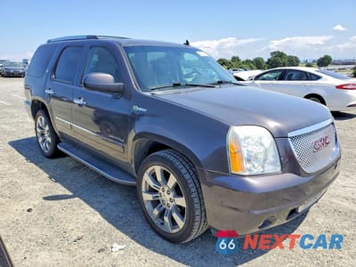 Czwarte zdjęcie samochodu z boku: 2010 GMC YUKON DENALI HYBRID VIN:1GKUKGEJ2AR208517 - miniatura
