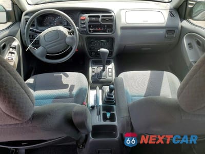 Zdjęcie 8 z 13 samochodu: 2003 CHEV TRACKER VIN:2CNBJ13CX36920520 - miniatura