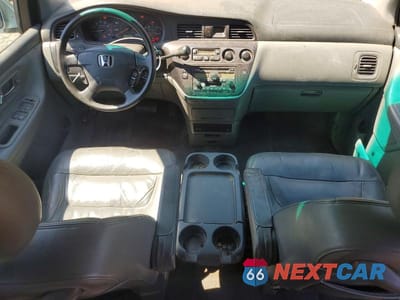 Zdjęcie 8 z 13 samochodu: 2004 HONDA ODYSSEY EXL VIN:5FNRL18004B135155 - miniatura
