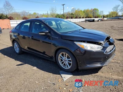 Czwarte zdjęcie samochodu z boku: 2017 FORD FOCUS SE VIN:1FADP3F29HL269167 - miniatura