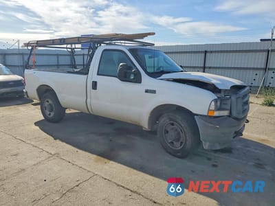 Czwarte zdjęcie samochodu z boku: 2003 FORD F250 SUPER DUTY VIN:1FTNF20L73EC44911 - miniatura