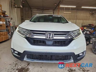 Piąte zdjęcie samochodu w środku: 2017 HONDA CR-V TOURING VIN:2HKRW2H91HH650118 - miniatura