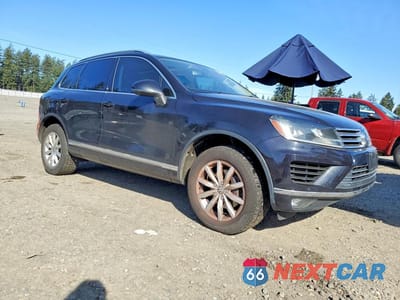 Czwarte zdjęcie samochodu z boku: 2015 VOLKSWAGEN TOUAREG V6 TDI VIN:WVGEP9BP8FD005699 - miniatura