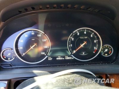 Zdjęcie 9 z 12 samochodu: 2015 BMW 740 I VIN:WBAYA6C59FGK16209 - miniatura