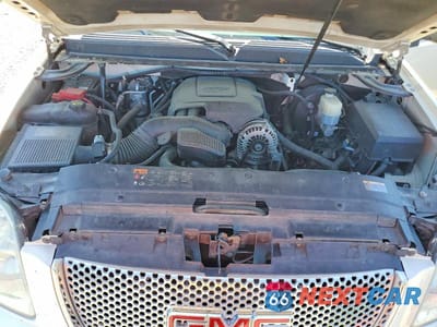 Zdjęcie 12 z 13 samochodu: 2011 GMC YUKON DENALI VIN:1GKS2EEFXBR349120 - miniatura