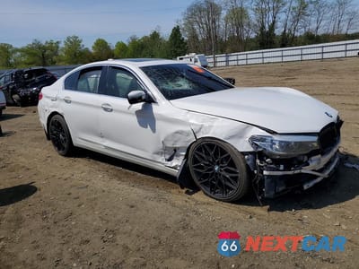Czwarte zdjęcie samochodu z boku: 2018 BMW 530 I VIN:WBAJA5C56JWA36912 - miniatura
