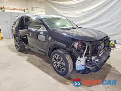 Czwarte zdjęcie samochodu z boku: 2024 TOYOTA RAV4 HYBRID LIMITED VIN:JTMD6RFV4RD142140 - miniatura