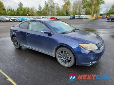 Czwarte zdjęcie samochodu z boku: 2006 SCION TC BASE VIN:JTKDE177560114427 - miniatura