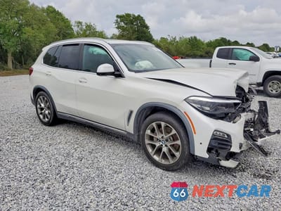 Czwarte zdjęcie samochodu z boku: 2020 BMW X5 SDRIVE 40I VIN:5UXCR4C04L9C33497 - miniatura