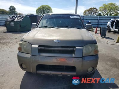 Piąte zdjęcie samochodu w środku: 2001 NISSAN FRONTIER SC VIN:1N6MD26Y31C356647 - miniatura