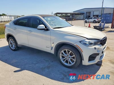 Czwarte zdjęcie samochodu z boku: 2016 BMW X6 XDRIVE35I VIN:5UXKU2C56G0N82808 - miniatura