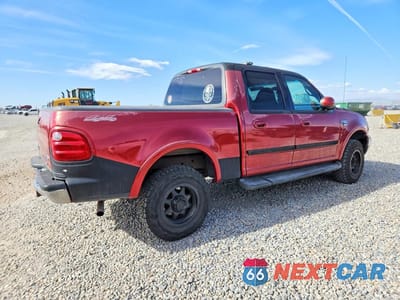 Trzecie zdjęcie samochodu z tyłu: 2001 FORD F150 SUPERCREW VIN:1FTRW08L31KE40269 - miniatura