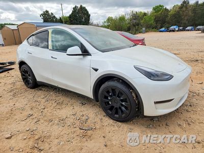 Czwarte zdjęcie samochodu z boku: 2023 TESLA MODEL Y VIN:7SAYGDEE7PF690919 - miniatura