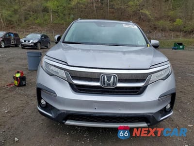 Piąte zdjęcie samochodu w środku: 2022 HONDA PILOT TOURING VIN:5FNYF6H68NB013567 - miniatura