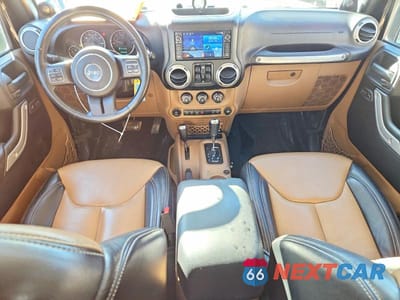 Zdjęcie 8 z 12 samochodu: 2014 JEEP WRANGLER UNLIMITED SAHARA VIN:1C4HJWEG8EL117971 - miniatura